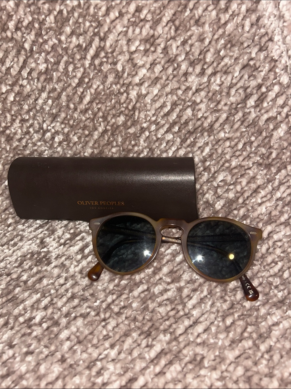 Oliver Peoples Matte Brown Round Sunglasses with Dark Lenses